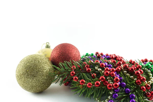 Branch of Christmas tree with decorations — Stock Photo, Image