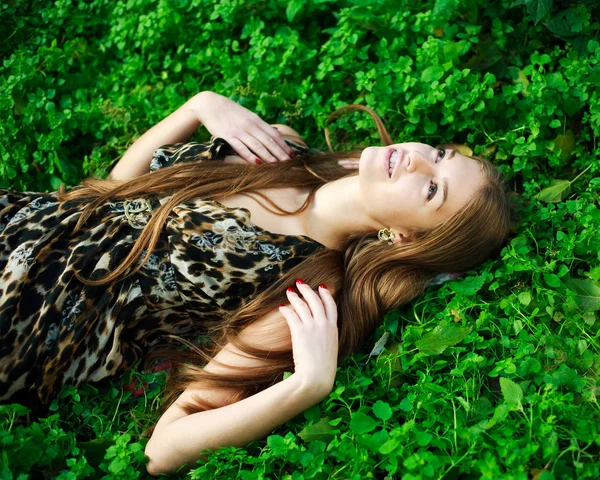 Close-up portrait of a beautiful young girl with makeup outdoors — Stock Photo, Image