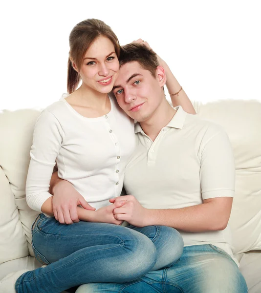 Pareja joven enamorada, sobre un fondo blanco, en el estudio —  Fotos de Stock