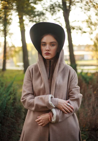 Stylish Fashionable Young Lady Beige Coat Hooded Cloak Park Background — ストック写真