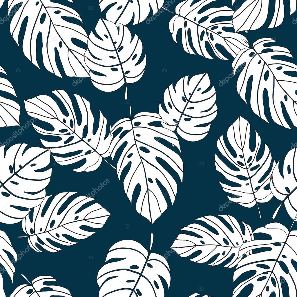 Vector seamless pattern tropical leaves on dark blue background