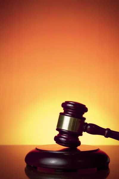 Judge gavel on orange background — Stock Photo, Image