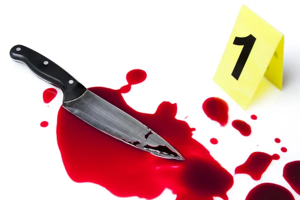 Evidence marker with blood and knife isolated on white — Stock Photo, Image