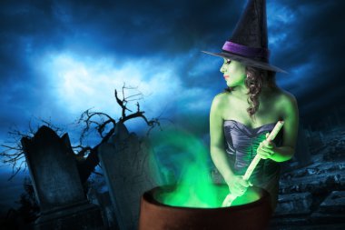 Cadılar Bayramı onun kazanı ile üzerinde cadı