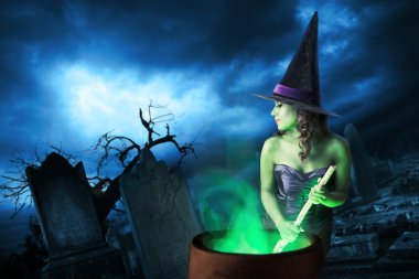 Cadılar Bayramı onun kazanı ile üzerinde cadı