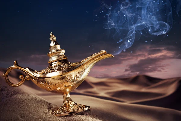 Magic Aladdin's Genie lamp on a desert — Stock Photo, Image