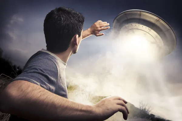 Man about to be abducted by aliens Royalty Free Stock Images