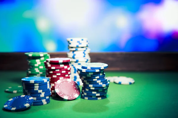 Casino chips on gaming table — Stock Photo, Image