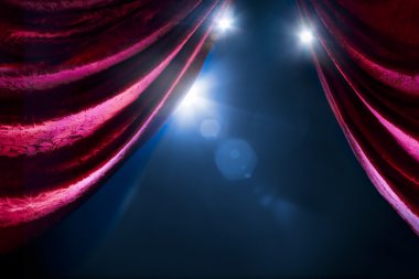 Theater curtain with dramatic lighting clipart