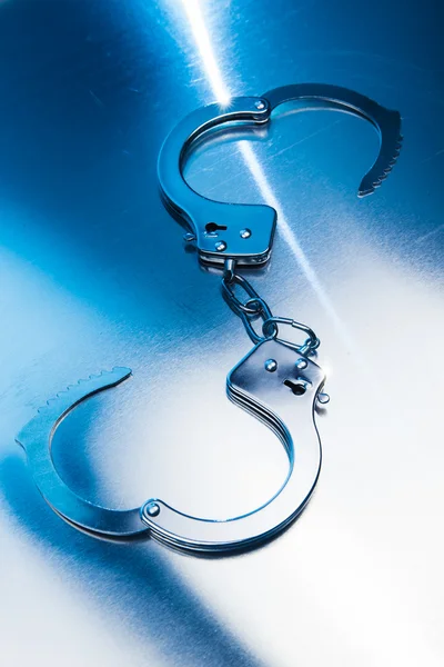 Closed handcuffs — Stock Photo, Image