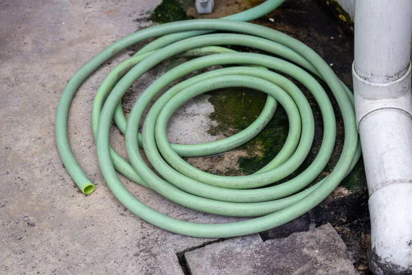 rubber hose home green cement tool.