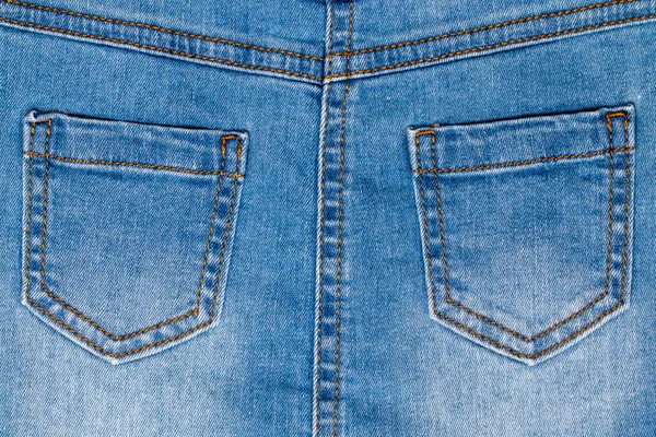 Denim Kieszenie Tekstury Zbliżenie Tyłu Widok Szczegółów Jasnoniebieskiej Tkaniny Jeansowa — Zdjęcie stockowe