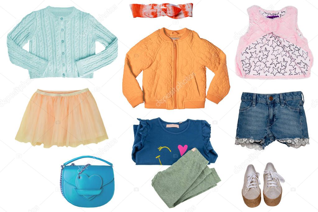 Collage set of little girl summer clothes isolated on a white background. The collection of blue denim shorts, a rain jacket, a vest, shoes, summer skirt, cardigan, a fur vest and other accessories. Little girl fashion.