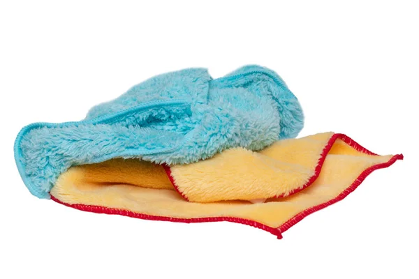 家庭の清潔さと衛生 白い背景に隔離された青と黄色のクリーニング布のクローズアップ マイクロファイバークリーニング布 マクロ — ストック写真