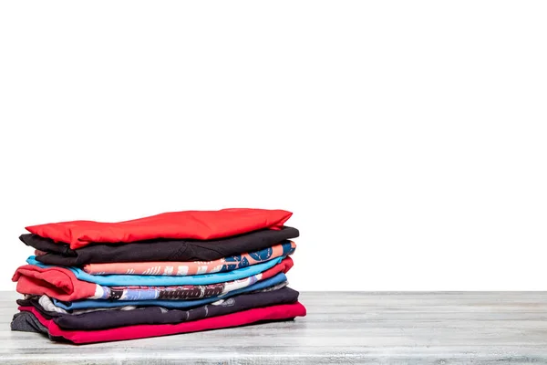 Een Stapel Overhemden Close Van Een Stapel Kleurrijke Shirts Shirts — Stockfoto