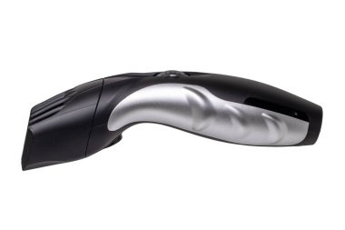 Close-up of a new black silver rechargeable beard and hair clipper isolated on a white background. Clipping path. Cordless hair and beard trimmer. Macro.