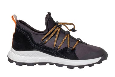 Closeup of a single of modern black sneaker or sports shoe isolated on a white background. Clipping path. Elegant and trendy mans shoe. Macro.