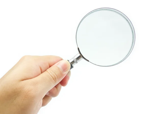 Magnifying glass in hand over white background — Stock Photo, Image