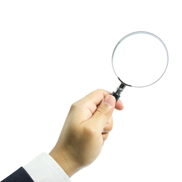 Magnifying glass in hand over white background — Stock Photo, Image