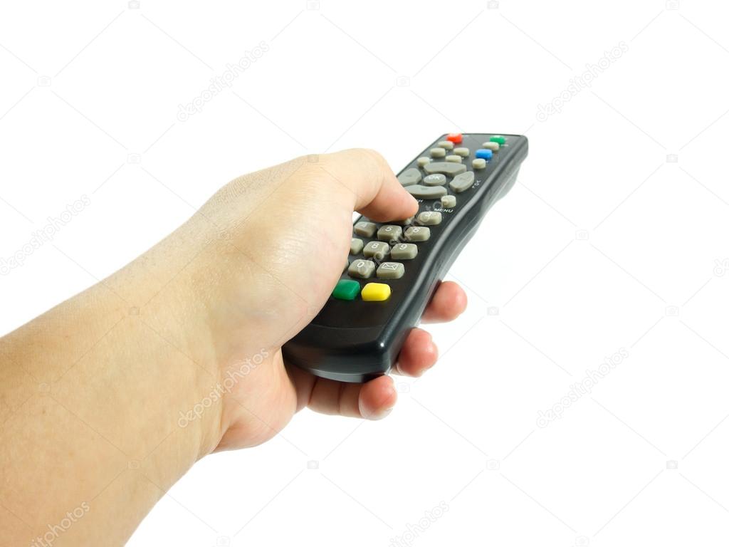 Remote control in hand concept over white background