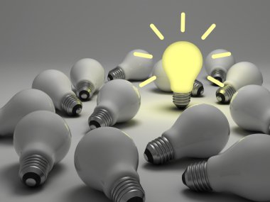 Lit light bulb standing out from the unlit incandescent bulbs , bright idea concept clipart