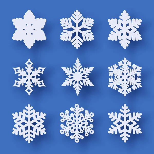 Vector Set White Christmas Paper Cut Snowflakes Shadow Blue Background — Stock Vector