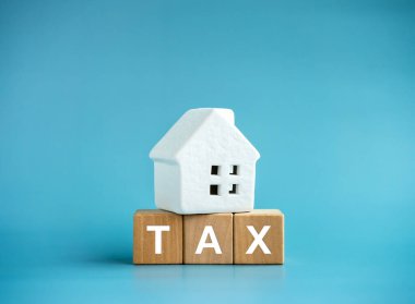 Home tax concept, residential or real estate property, land and building annual taxation. Word 
