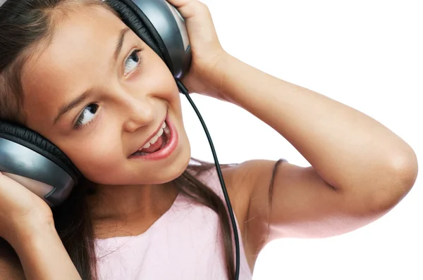 The girl is listening to music — Stock Photo, Image