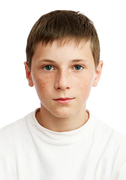 Portrait of serious boy with freckles — Stock Photo, Image