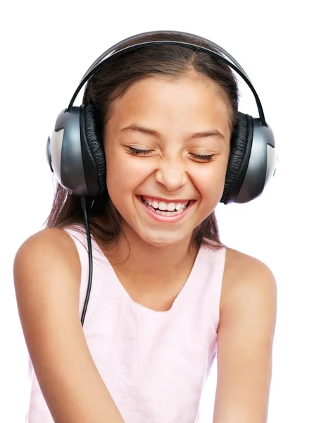 The girl is listening to music — Stock Photo, Image