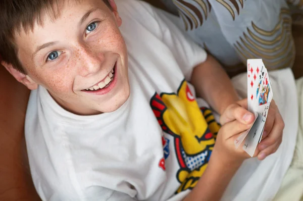 Portrait of a boy with cards — Stock Photo, Image