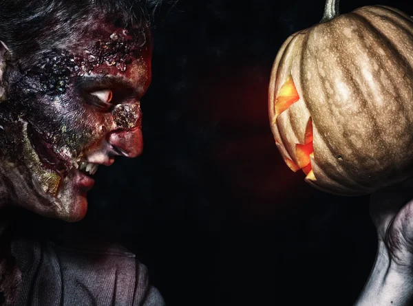 The boy is zombie with pumpkin — Stock Photo, Image