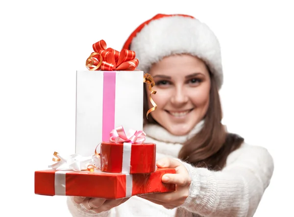 The smiling girl is giving the gifts — Stock Photo, Image