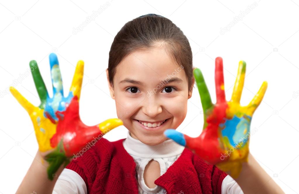 little girl with her hands painted