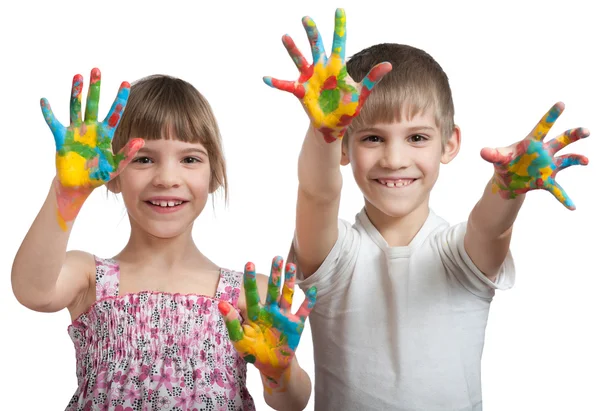 Kids show their hands soiled in a paint — Stockfoto