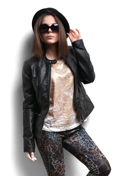 Girl in a leather jacket and black hat — Stock Photo, Image