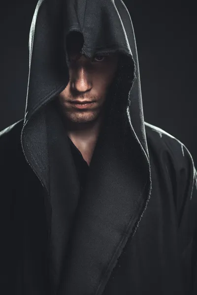 Guy in a black robe — Stock Photo, Image