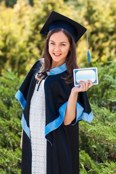 University graduate with a diploma — Stock Photo, Image
