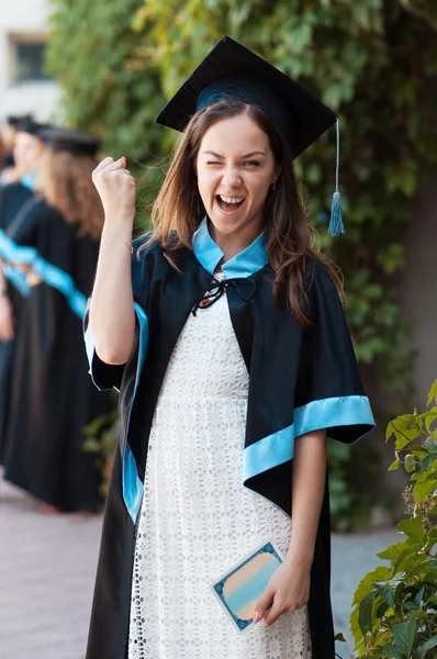 University graduate with a diploma — Stock Photo, Image