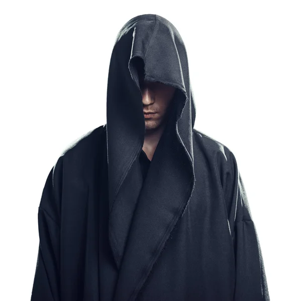Retrato del hombre con una túnica negra Imágenes de stock libres de derechos