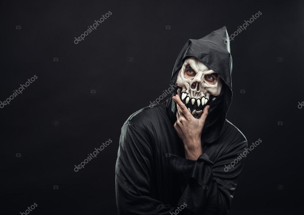 skull wearing hoodie