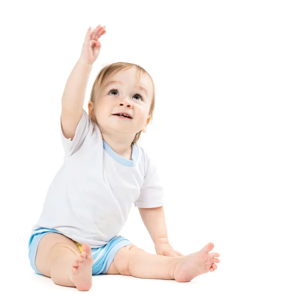 Baby sitting and points his hand up — Stock Photo, Image