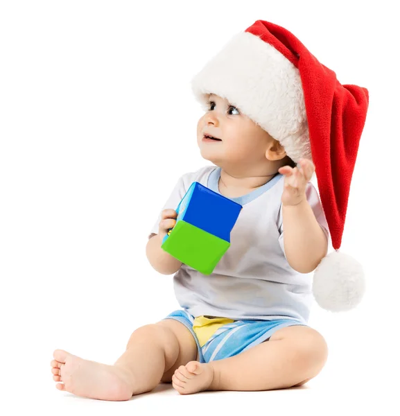 Bebê de chapéu de Natal queria algo — Fotografia de Stock