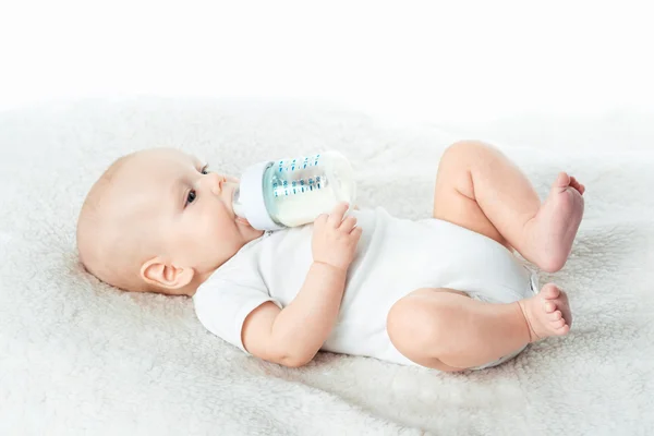 Baby eats from nipples — Stock Photo, Image
