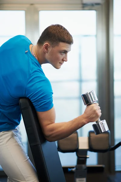 Man doing exercises dumbbells — Stock Photo, Image