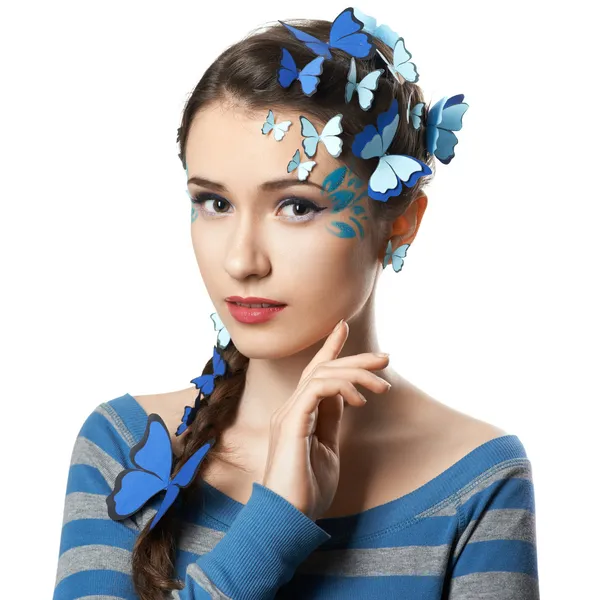Flicka med konst make-up blå fjärilar — Stockfoto