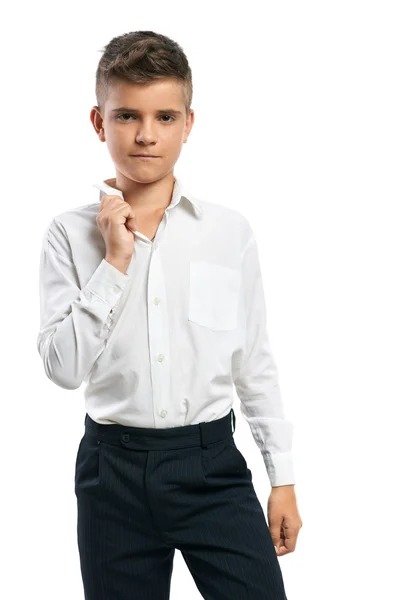 Serious boy adjusts his collar — Stock Photo, Image