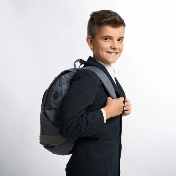 Menino de escola feliz com bolsas de estudo — Fotografia de Stock