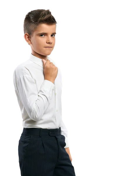 Serious boy adjusts his collar — Stock Photo, Image