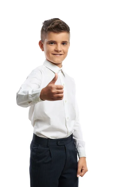 Šťastný chlapec ukazuje palec — Stock fotografie